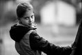 Portrait of little girl in the village. Black and white photo. Royalty Free Stock Photo