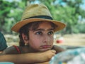 Portrait of a little girl wearing a hat outdoors Royalty Free Stock Photo