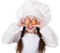 Portrait of a little girl in a white apron holding two chicken e Royalty Free Stock Photo