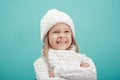 Portrait of a little girl in white hat and scarf Royalty Free Stock Photo