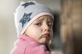 Portrait of a little girl who cries, runny nose Royalty Free Stock Photo