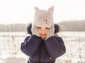 Portrait of a little girl in winter on a sunny day Royalty Free Stock Photo