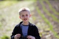 Portrait of little handsome serious cute blond boy with funny un Royalty Free Stock Photo
