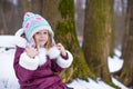 Portrait of little happy girl in the snow sunny Royalty Free Stock Photo