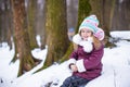 Portrait of little happy girl in the snow sunny Royalty Free Stock Photo