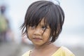 Portrait of a little indonesian child at the streets. Kuta, Bali,Indonesia