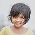 Portrait of a little indonesian girl at the streets
