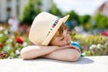 Portrait of little kid boy in hat in summer. Happy child. Royalty Free Stock Photo