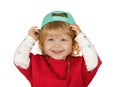 Portrait of a little lovely girl wearing a red t shirt and a baseball cap