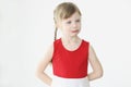 Portrait of little offended girl on white background