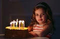 Portrait of little pretty girl with birthday cake Royalty Free Stock Photo