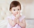 Portrait of a little sweet girl at home, close-up