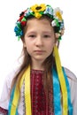 Portrait of a little Ukrainian girl with tearful eyes. Child in national dress