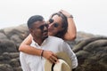 Portrait of living young couple at the beach. They are happy and smile. Concept of just married family Royalty Free Stock Photo