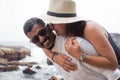 Portrait of living young couple at the beach. They are happy and smile. Concept of just married family Royalty Free Stock Photo