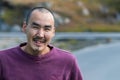 Portrait of a local inuit young man looking camera in Sisimiut, Greenland.