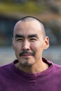 Portrait of a local inuit young man looking camera in Sisimiut, Greenland.