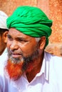 Portrait of a local man sitting in the courtyard of Jama Masjid