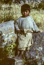 portrait of local young boy in traditonal way linen at island Taquile in lake Titicaca