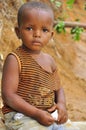 Portrait of lonely sad little african boy