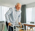 senior care help walker assistence retirement home nursing elderly man hospital clinic home disability disabled alone Royalty Free Stock Photo