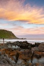 A portrait long exposure sunset over the beach at Petrel Cove located on the Fleurieu Peninsula Victor Harbor South Australia on