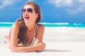 Portrait of long haired girl in bikini and wearing red lips on tropical barbados beach Royalty Free Stock Photo