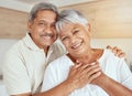 Portrait, love and senior couple hug in a living room, happy and relax in their home together. Face, smile and holding Royalty Free Stock Photo