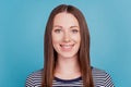 Portrait of lovely adorable positive lady toothy beaming smile on blue background