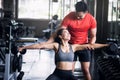 Fitness couple train with Dumbbells in gym Royalty Free Stock Photo