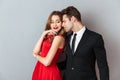 Portrait of a lovely attractive couple dressed in formal wear Royalty Free Stock Photo