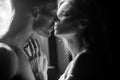 Portrait of lovely couple in love. Young sensual girlfriend glad to passionate kiss from her boyfriend. Handsome man Royalty Free Stock Photo