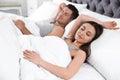 Portrait of lovely couple sleeping in bed Royalty Free Stock Photo