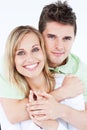 Portrait of a lovely couple smiling at the camera Royalty Free Stock Photo