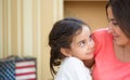 Portrait of lovely hispanic mother and daughter