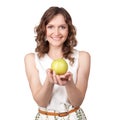 Portrait of young girl which gives of a green apple Royalty Free Stock Photo