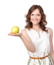 Portrait of young girl which gives of a green apple Royalty Free Stock Photo