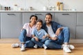 Portrait of loving african american family posing at kitchen Royalty Free Stock Photo