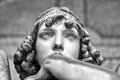 Portrait of loving angel on marble, monumental cemetery of Genoa, Italy, one of the most important monumental cemeteries in Europe