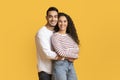 Portrait Of Loving Arab Man And Woman Embracing And Smiling At Camera Royalty Free Stock Photo