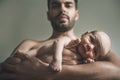 Portrait of loving father with baby at home. Sepia Toned Royalty Free Stock Photo