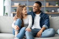 Portrait Of Loving Interracial Couple Relaxing Together At Home Royalty Free Stock Photo