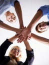 Portrait, low angle and happy people with hand huddle in support, faq and target of success, business goals or trust