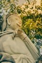 Portrait Low Angle Zoom View Marble Sun Wukong or Monkey King Statue in Vintage Tone Royalty Free Stock Photo