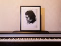 Portrait of Ludwig Beethoven next to the piano keyboard. The concept of the anniversary of the birth of the famous composer.