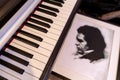 Portrait of Ludwig Beethoven next to the piano keyboard. The concept of the anniversary of the birth of the famous composer.