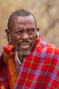 Portrait of a Maasai man wearing traditional dress, Massai Mara, Kenya