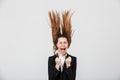 Portrait of a mad businesswoman dressed in suit Royalty Free Stock Photo