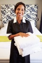 Portrait Of Maid Tidying Hotel Room Royalty Free Stock Photo