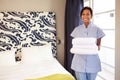 Portrait Of Maid Tidying Hotel Room Royalty Free Stock Photo